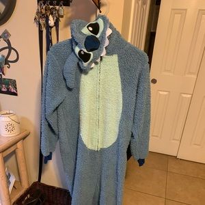 Disney Stitch Sleeper Size Medium. This will fit adult and fits a teenager.